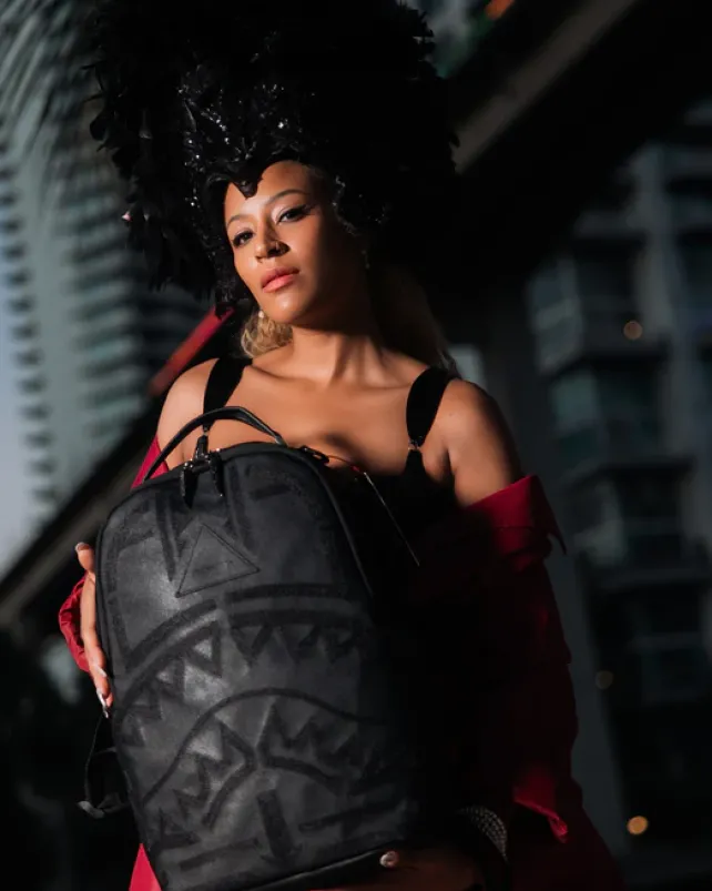 BACKPACKS>SPRAYGROUND AFRICAN INTELLIGENCE 9 APEX GENIUS BACKPACK - SANDFLOWER COLLAB