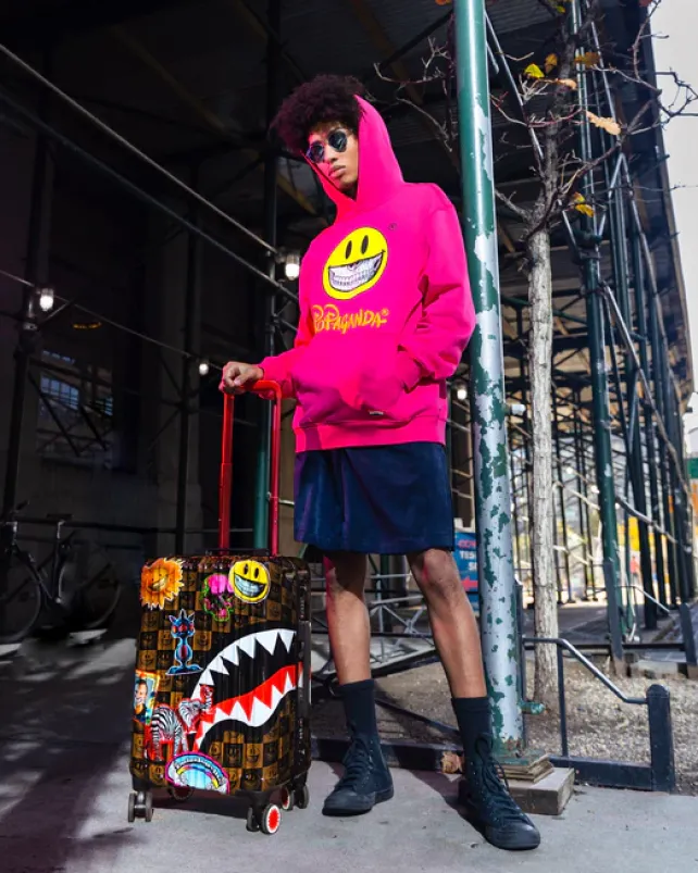 CARRY-ON LUGGAGE>SPRAYGROUND GLOBAL MOGUL POPAGANDA RON ENGLISH EDITION HARDSHELL CARRY-ON LUGGAGE
