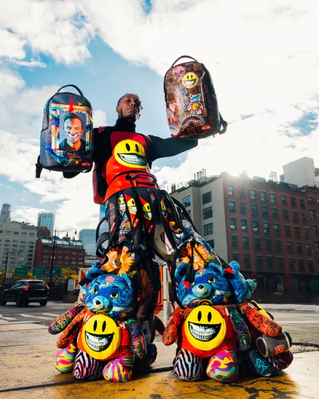 BACKPACKS>SPRAYGROUND GLOBAL MOGUL POPAGANDA RON ENGLISH EDITION BACKPACK