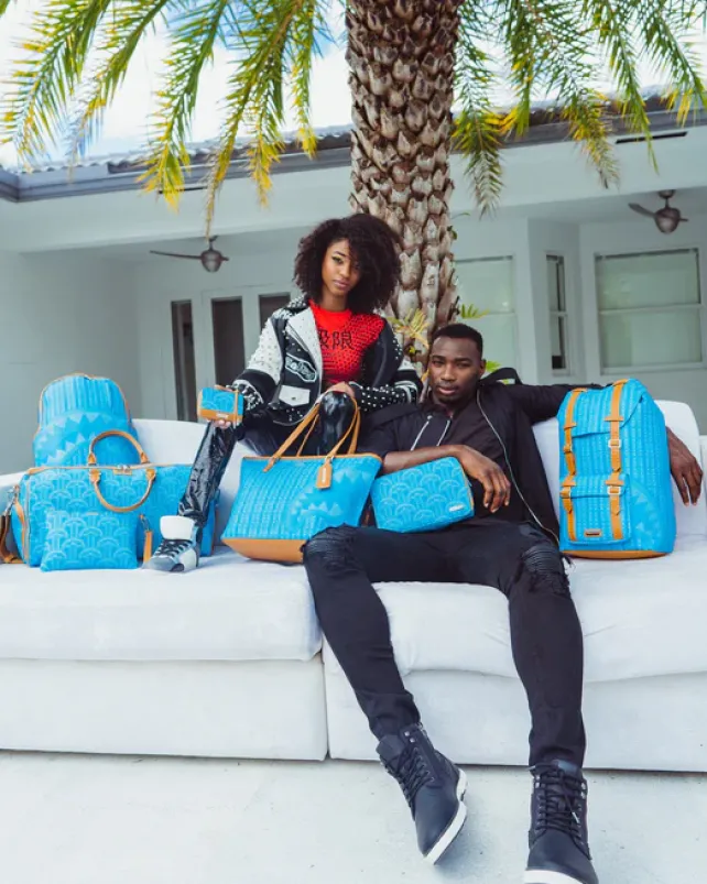 BACKPACKS>SPRAYGROUND ILLUCHAINS TURQ BACKPACK (DLXV)