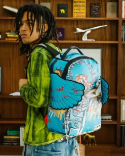 BACKPACKS>SPRAYGROUND OFFICIAL BASQUIAT UNTITLED (FALLEN ANGEL) 1981 WING BACKPACK (DLXV)