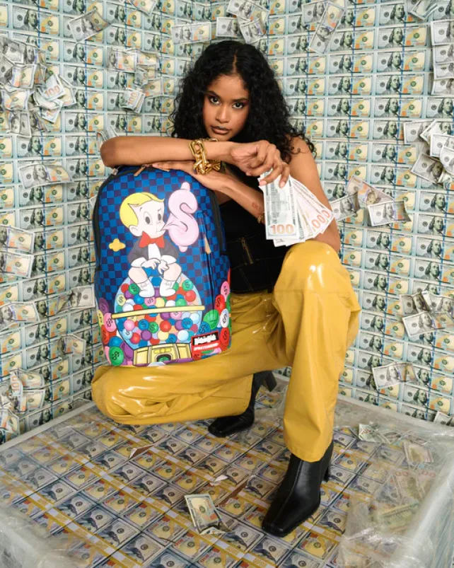 BACKPACKS>SPRAYGROUND RICHIE RICH MONEY MONEY MONEY BACKPACK (DLXV)