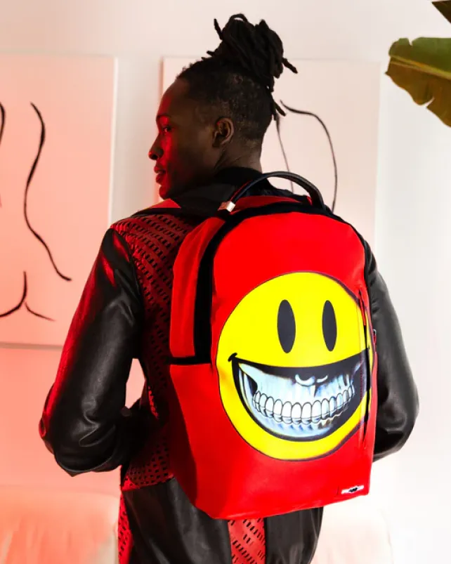 BACKPACKS>SPRAYGROUND SMILE BIG GRIN RON ENGLISH COLLAB