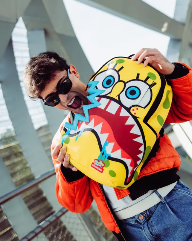 BACKPACKS>SPRAYGROUND SPONGEBOB SHARKBITE BACKPACK (DLXV)