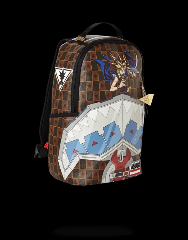 BACKPACKS>SPRAYGROUND YU GI OH DUAL DISK SHARK