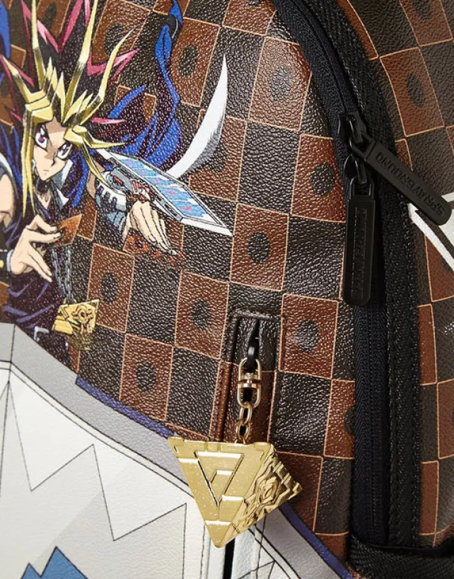 BACKPACKS>SPRAYGROUND YU GI OH DUAL DISK SHARK